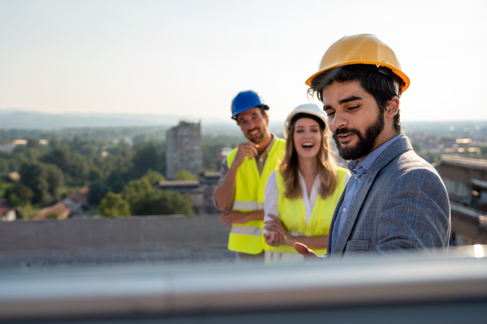 Roofing professionals reviewing plans - SEO helps get your business found